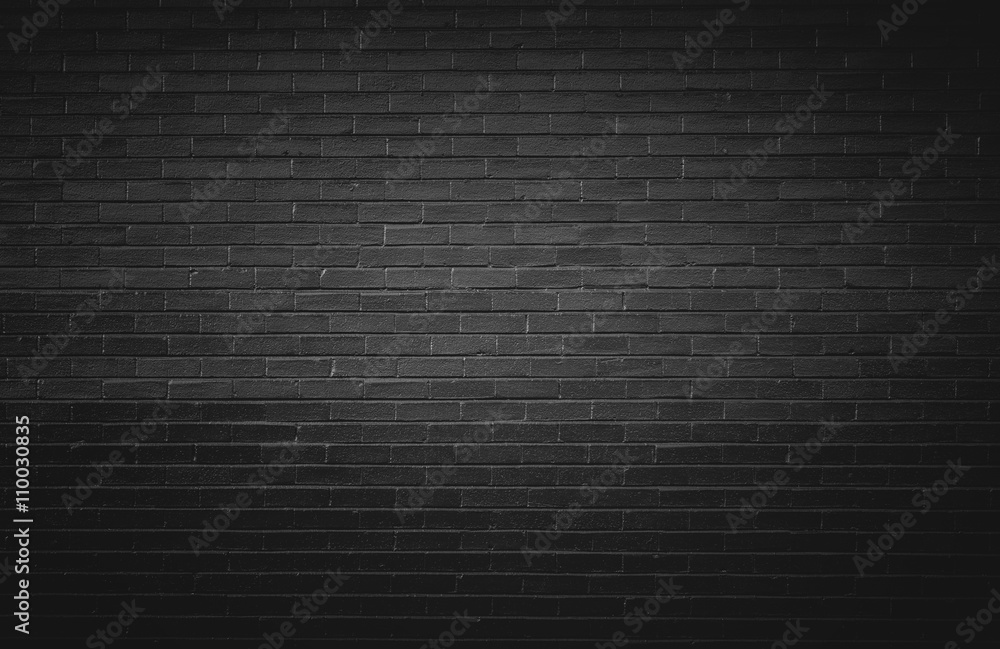 Naklejka premium Czarny ściana z cegieł tło