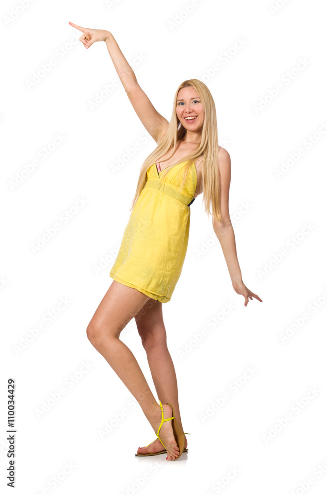 Caucasian fair model in yellow summer dress isolated on white Caucasian fair model in yellow summer dress isolated on white