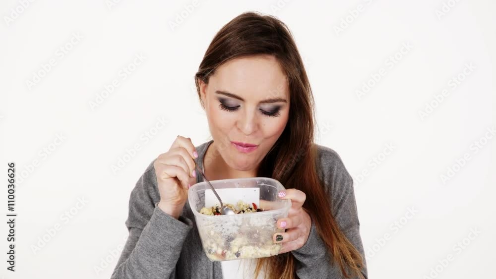 Woman eat oatmeal with dry fruits. Dieting 4K. Woman eat oatmeal with dry fruits. Dieting 4K.