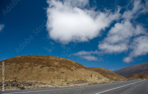 Driving on highway 200 through Mauna Kea hills to Hilo