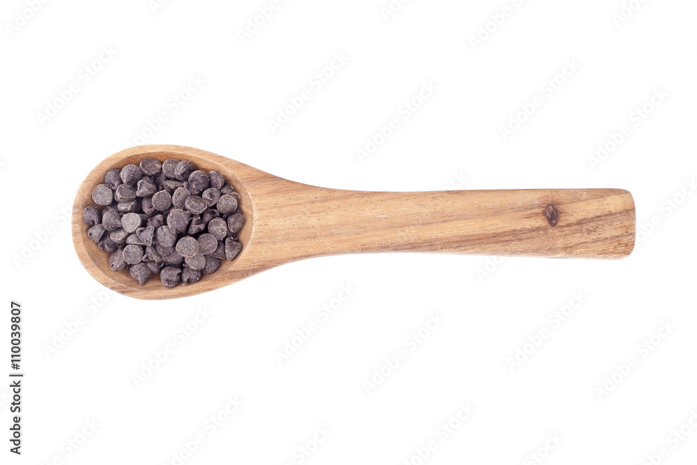 chocolate kisses in wooden spoon chocolate kisses in wooden spoon