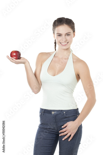smiling girl holding a red apple