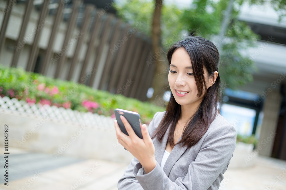 Business woman use of mobile phone Business woman use of mobile phone