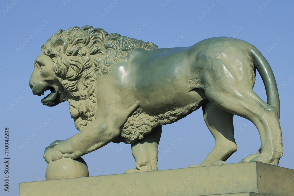 Sculpture of a lion at the Palace Bridge closeup. Saint-Petersburg, Russia