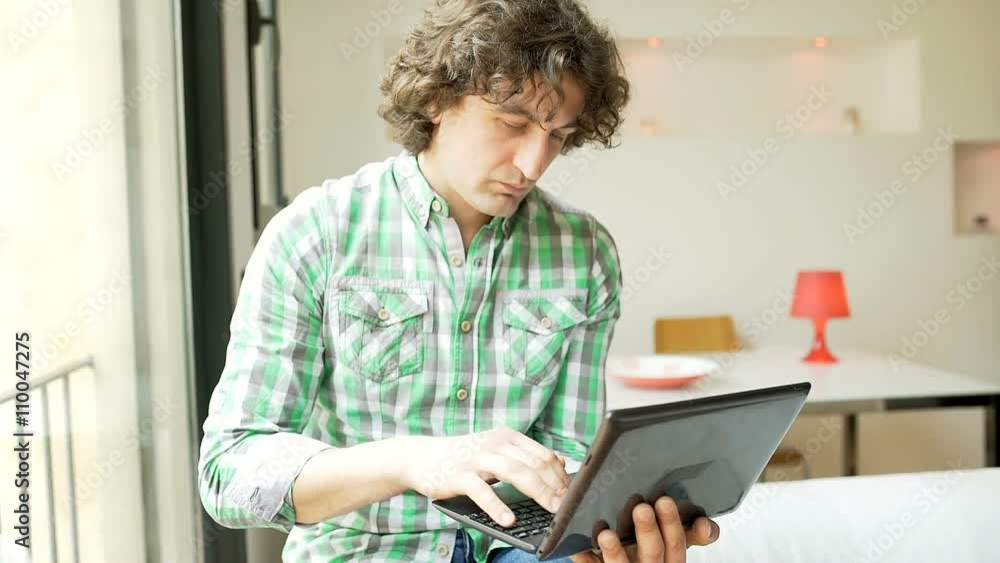 Absorbed man typing something on laptop, steadycam shot
Absorbed man typing something on laptop, steadycam shot
