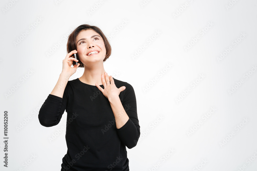 Smiling casual woman talking on the phone Smiling casual woman talking on the phone
