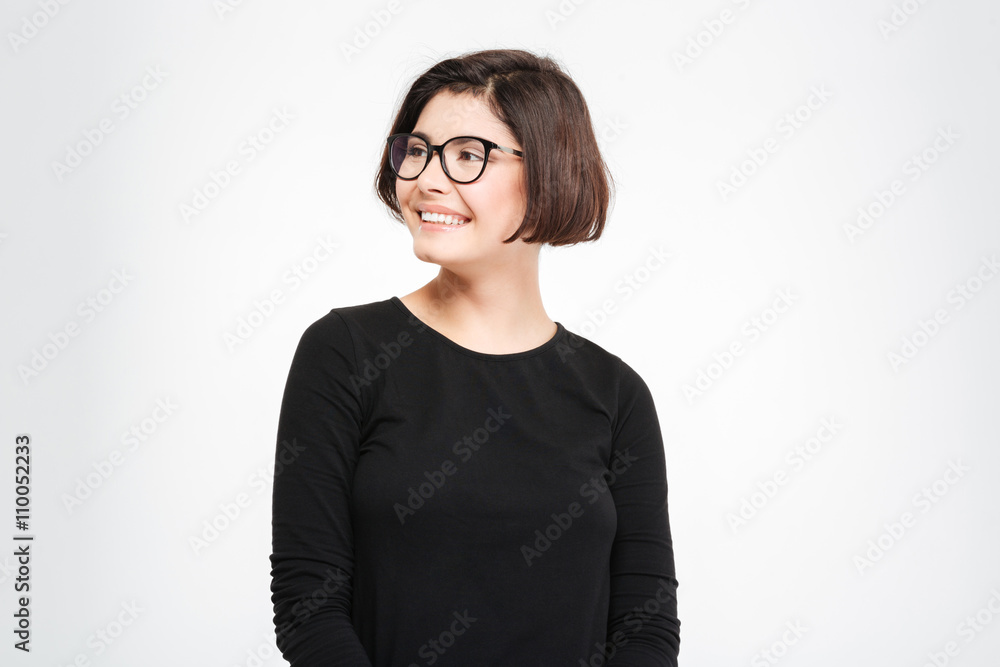 Cheerful young woman looking away Cheerful young woman looking away