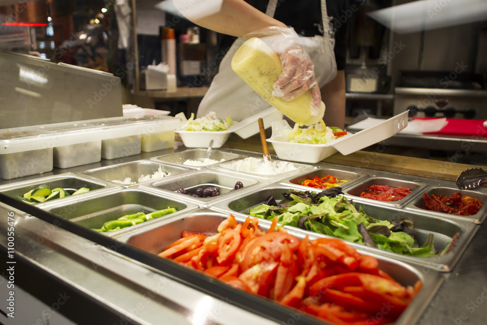 Obraz premium chef working in a commercial kitchen.