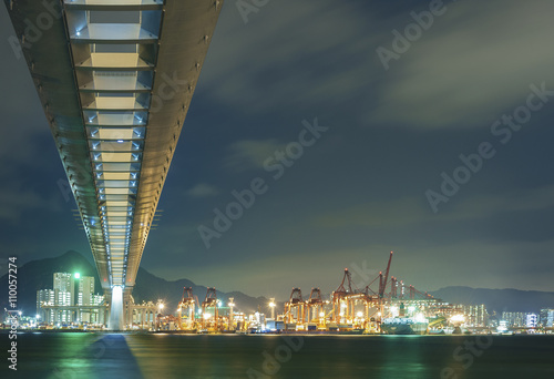 Cutterstone bridge and container port in Hong Kong © leeyiutung