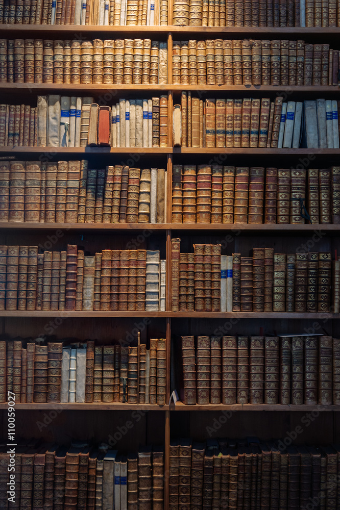 Wooden cabinet fool of ancient dusty books Wooden cabinet fool of ancient dusty books