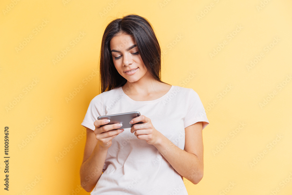 Happy cute woman using smartphone Happy cute woman using smartphone
