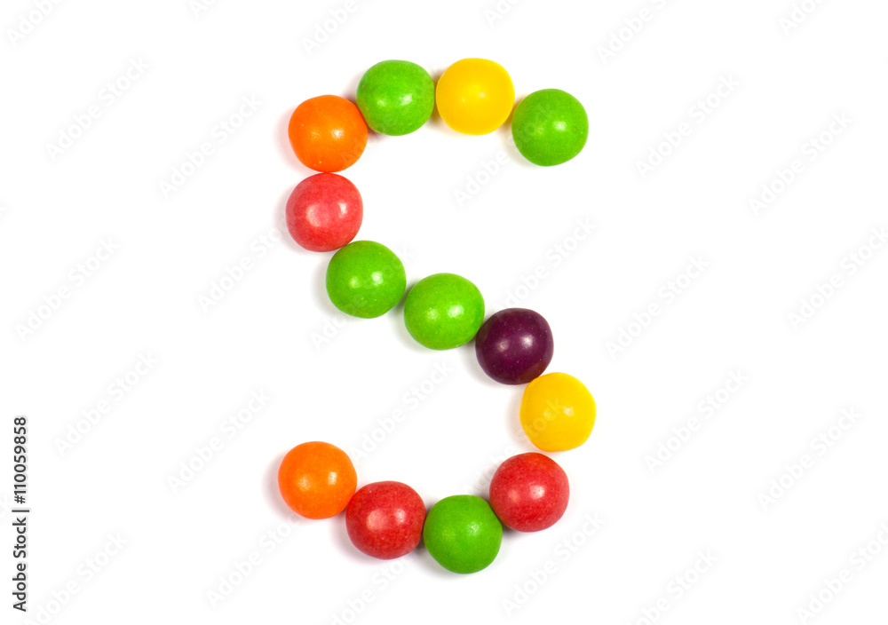 Multicolored candy on a white background.