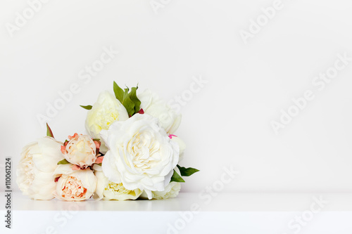 Fototapeta Naklejka Na Ścianę i Meble -  Bouquet Of Peonies On Table