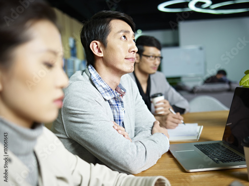 Photography young asian businessman thinking during meeting