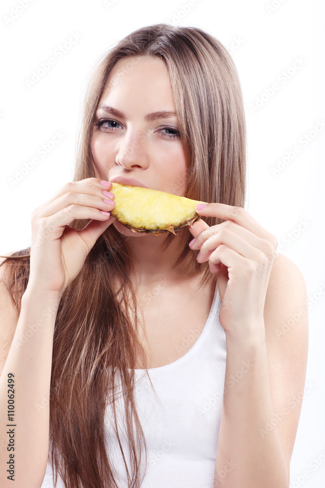 Girl holding a pineapple