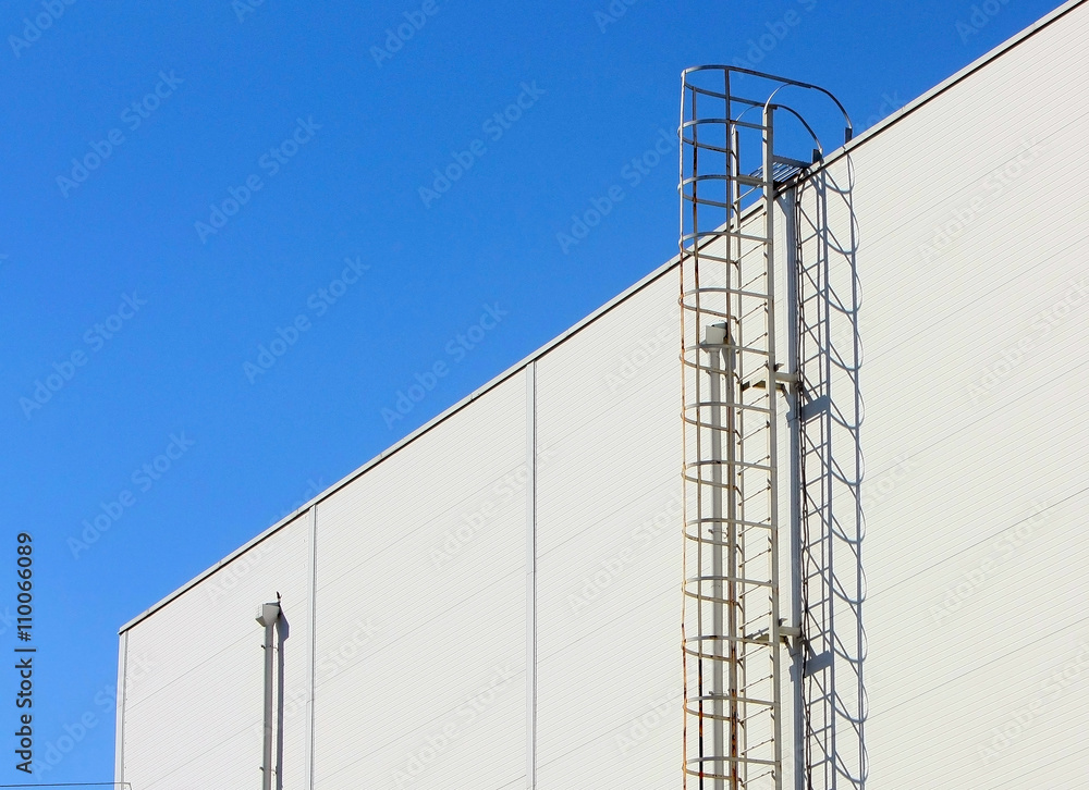 The staircase leading to the roof of a modern building. Stairs at the mall. Go up to the next level. The staircase leading to the roof of a modern building. Stairs at the mall. Go up to the next level.