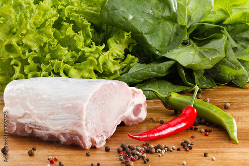 Raw steak with vegetables, ...