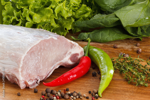 Raw steak with vegetables, ...
