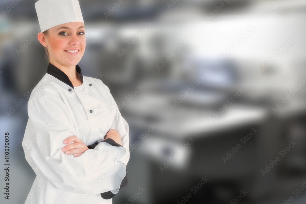 Composite image of happy female chef with arms crossed 