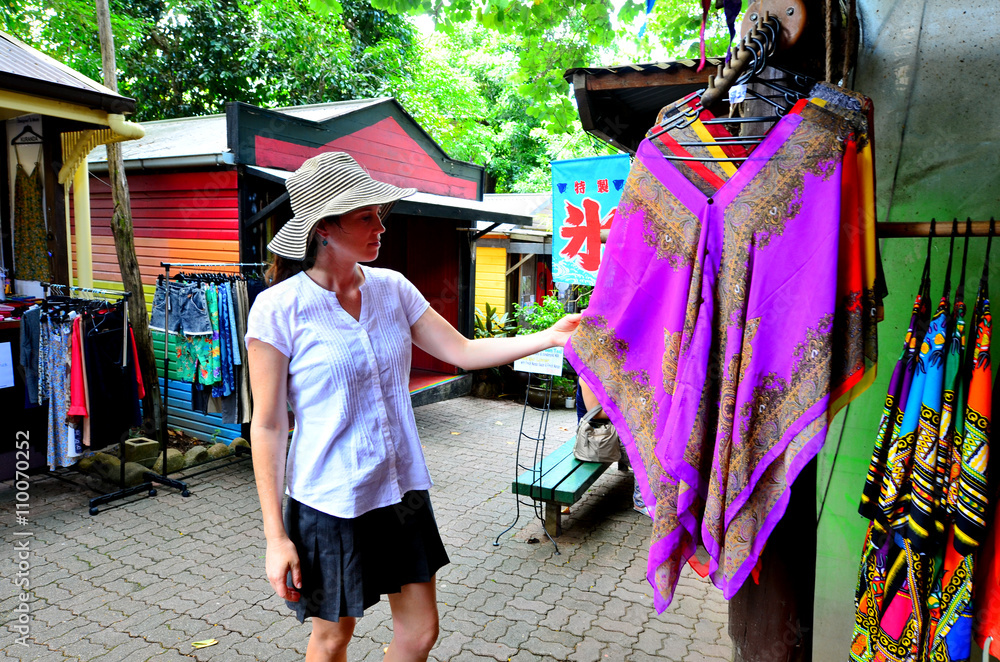 Woman shopping at the Original Rainforest  Market in Kuranda Que