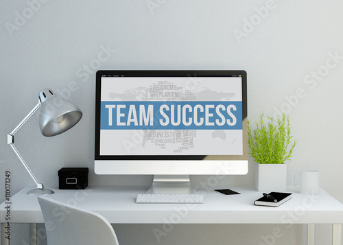 modern clean workspace with team success keyworkds on screen photo