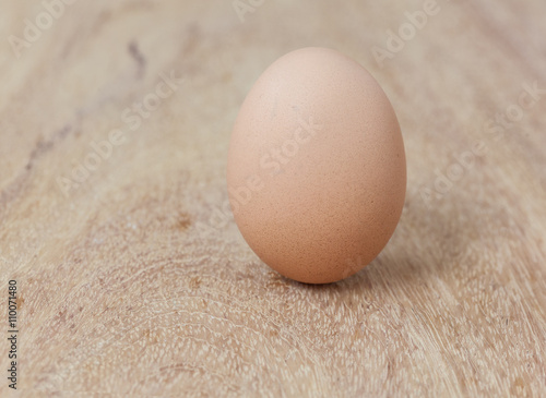 Egg on wooden table