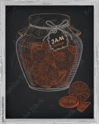 beautiful jar of homemade jam with orange on a black background