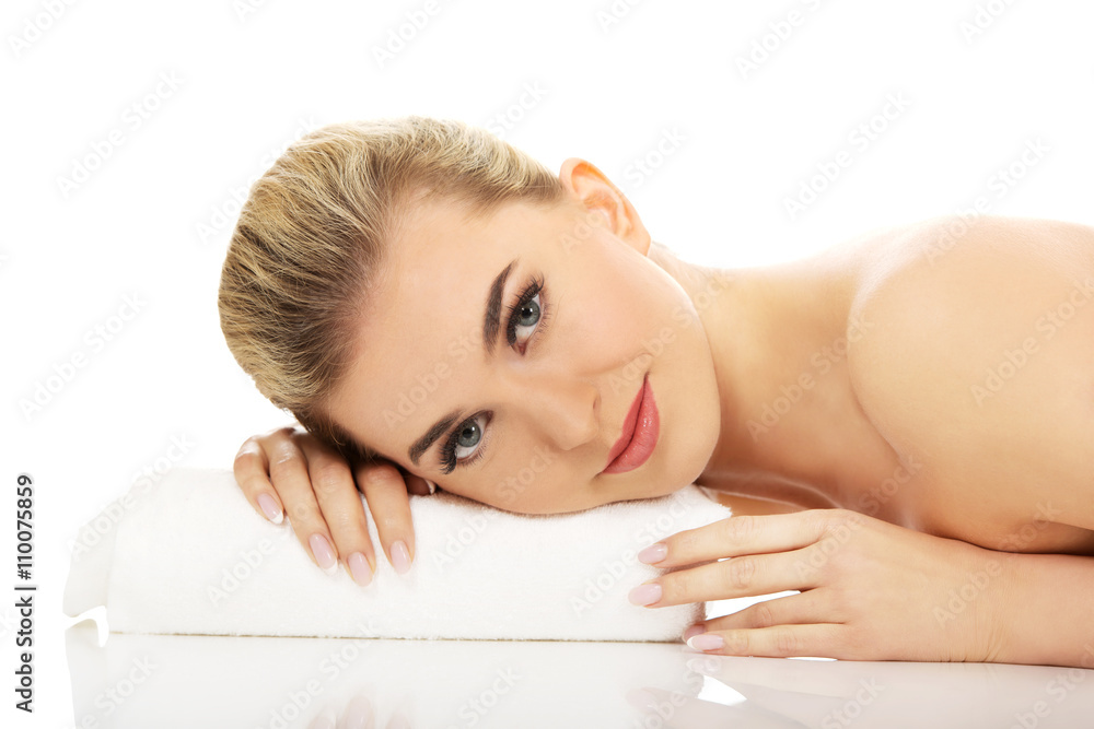 Young woman lying on the floor