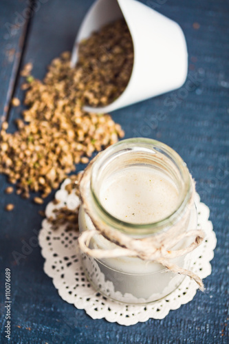 vegan fresh milk from hemp seeds in a glass jar  clean eating