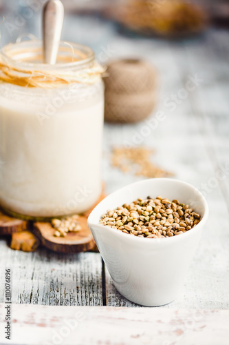 vegan fresh milk from hemp seeds in a glass jar