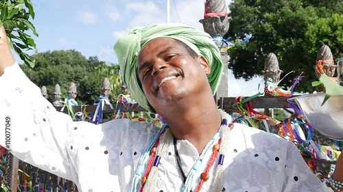 Brazilian man wearing traditional clothes at Bonfim Church in Salvador, Bahia, Brazil photo