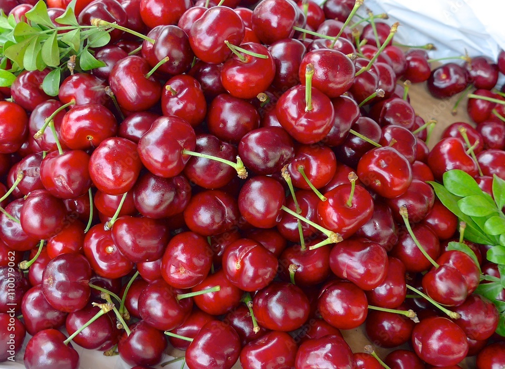 Fresh red cherries closeup at the market Fresh red cherries closeup at the market