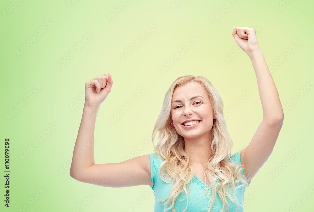 happy young woman or teen girl celebrating victory happy young woman or teen girl celebrating victory