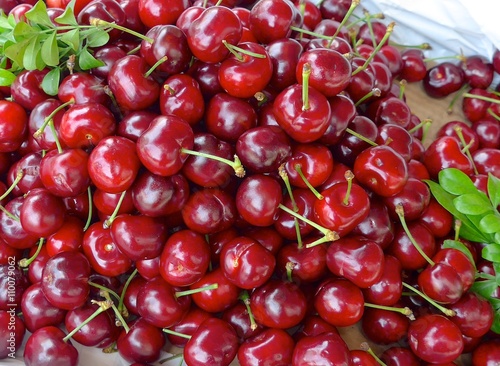 Fresh red cherries closeup at the market