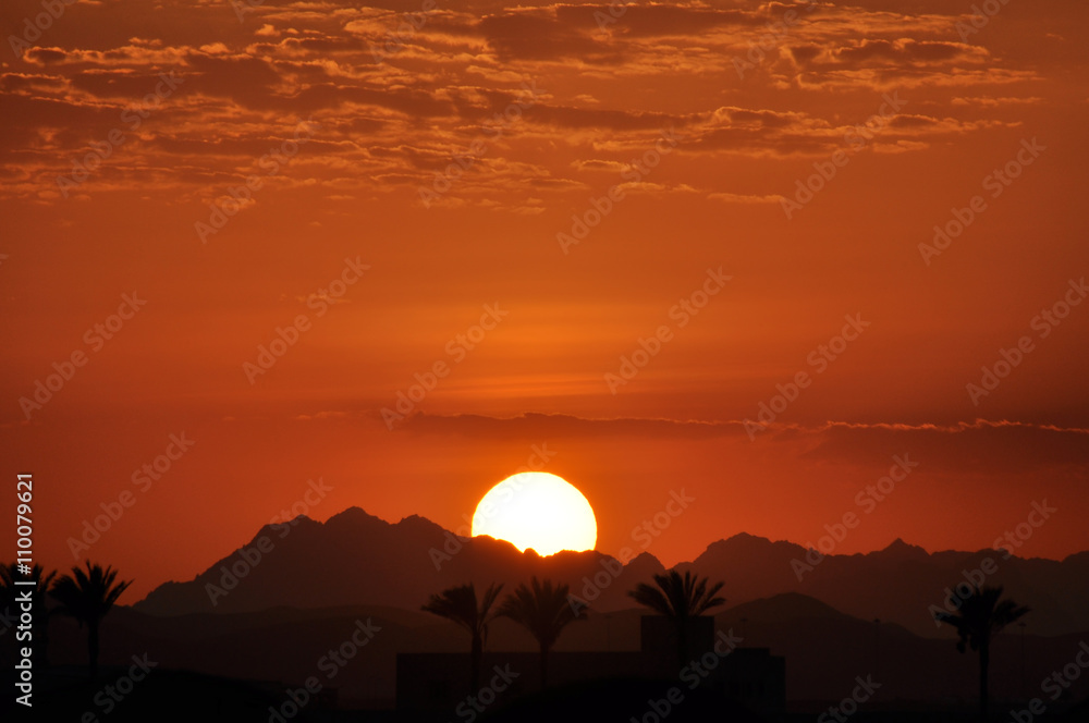 The sunset over the mountains of the Sinai Peninsula Sharm El-Sheikh . Egypt The sunset over the mountains of the Sinai Peninsula Sharm El-Sheikh . Egypt