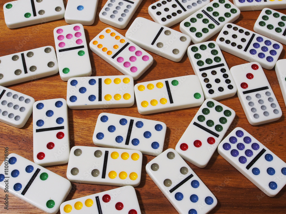 dominoes on wooden background dominoes on wooden background