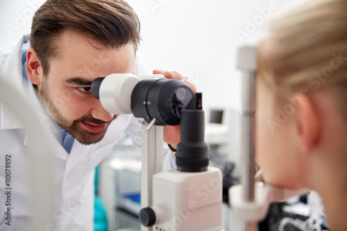 Fototapeta Naklejka Na Ścianę i Meble -  optician with tonometer and patient at eye clinic