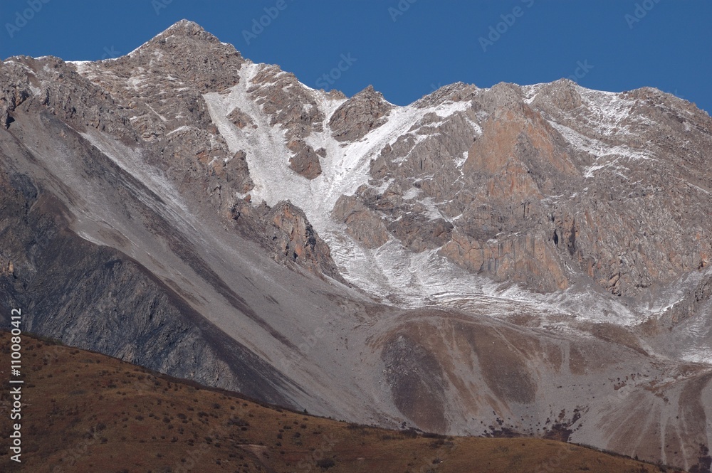 Fototapeta premium Some Snow covered mountains in Huanglong Scenic Areas
