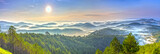 Panorama sunrise over hill with the sun radiating golden rays pierced the hills with pine trees covered with morning dew beautiful ray beam forming to welcome the new day so simple in Dalat, Vietnam