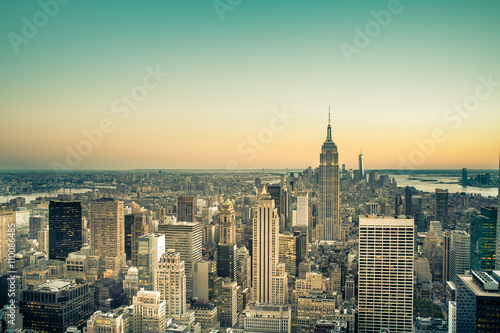 Midtown Manhattan view across skyscrapers in New York City with vintage filter effect © littleny
