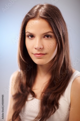 Closeup portrait of pure young woman