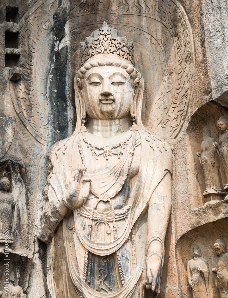 Stone buddhist statue in Longmen Grottoes, China