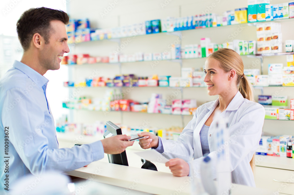 Pharmacist and client at pharmacy
Pharmacist and client at pharmacy