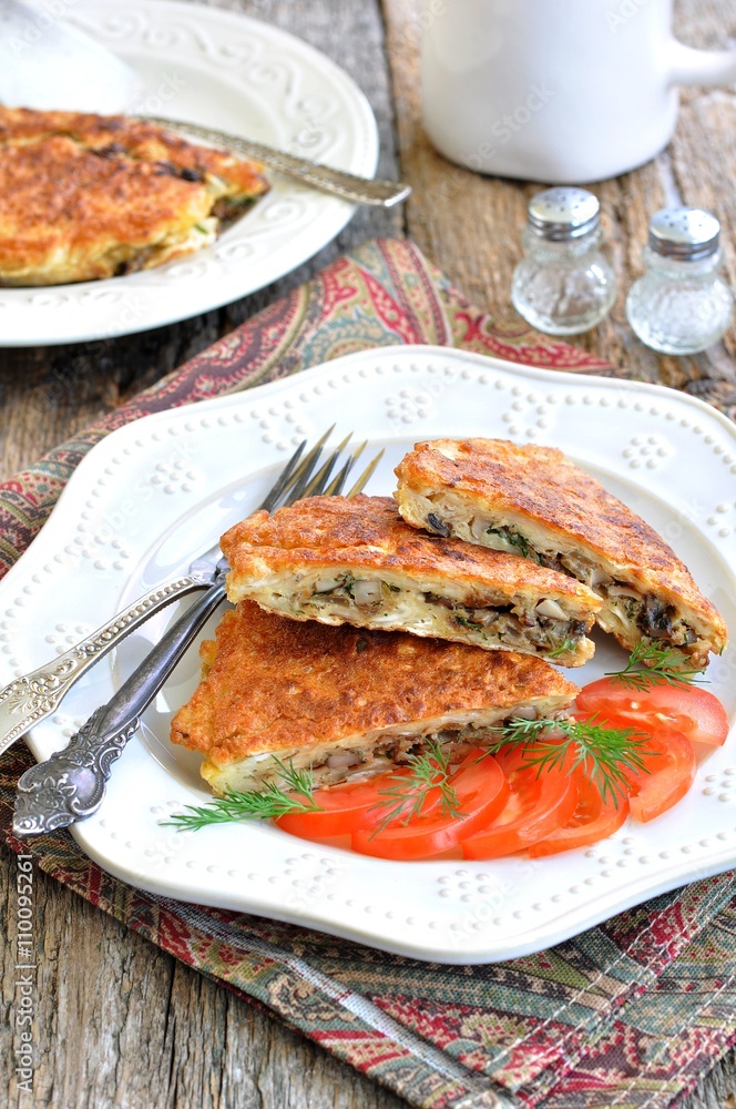 Matzo Brei a Jewish recipe of dampened matzo crackers fried with eggs, mushrooms, onions and dill. Matzo Brei a Jewish recipe of dampened matzo crackers fried with eggs, mushrooms, onions and dill.