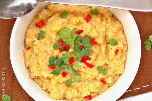 Peas pudding with coriander and chilli in the bowl