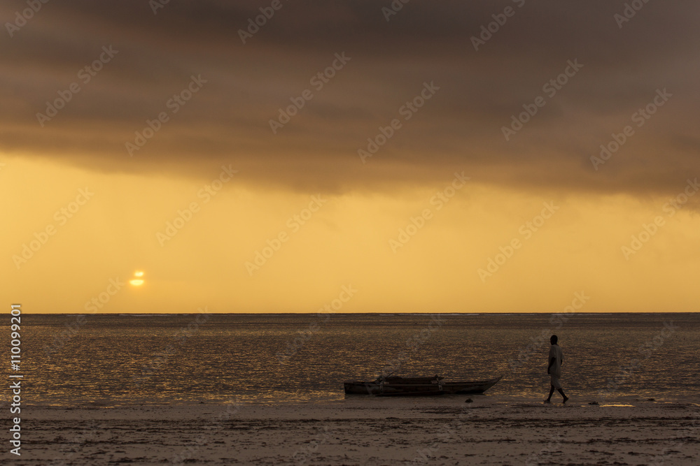 Silhouette of fisherman preparing for fishing at sunrise in Zanz