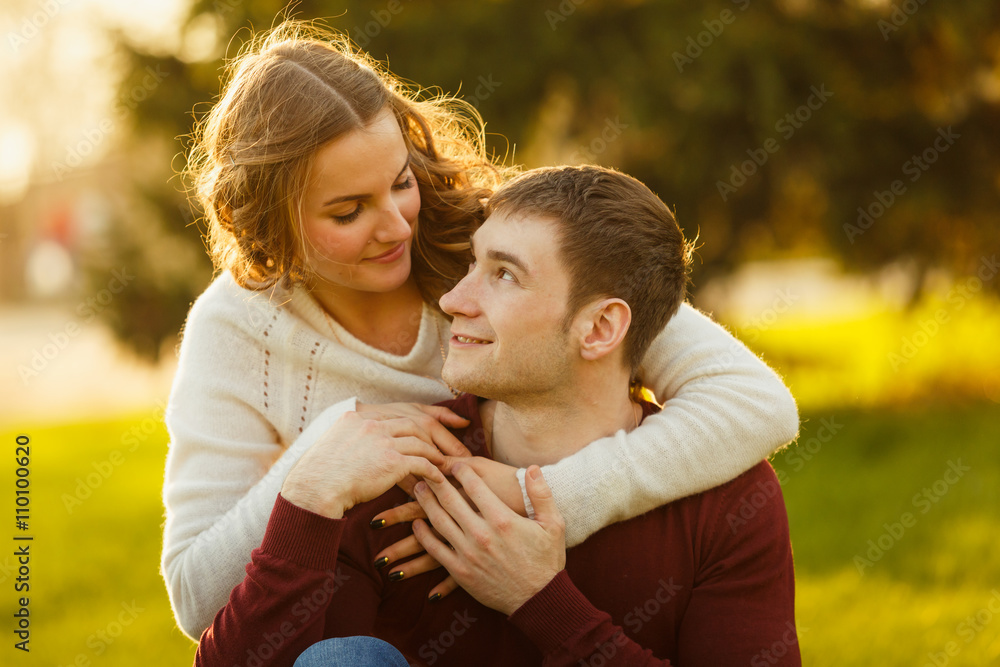 Young couple spend a weekend or holiday in park or pine forest. Young couple spend a weekend or holiday in park or pine forest.