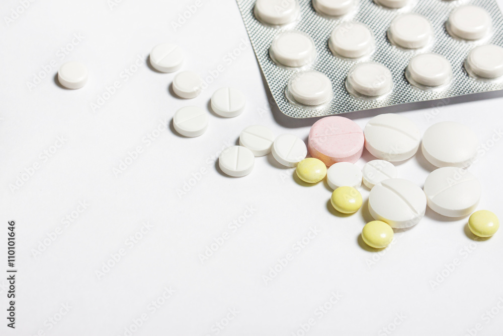 tablets on a white background top view. tablets on a white background top view.