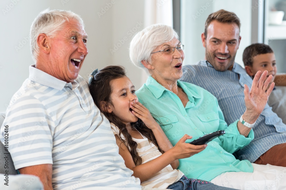 Happy family sitting on sofa Happy family sitting on sofa
