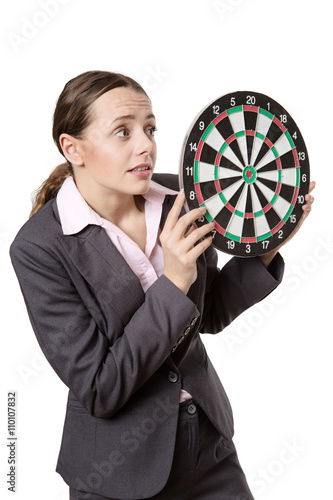 Photos business woman holding dartboard